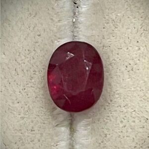 2.96 carat oval shaped ruby (July birthstone) - rich, deep, even color